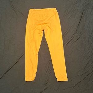 Neon orange stretchy leggings. Never Worn